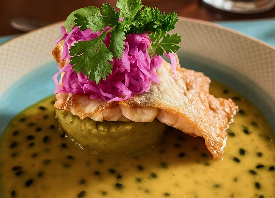 Aerial view of the Finca Rosa Blanca swimming pool surrounded by lush greenery