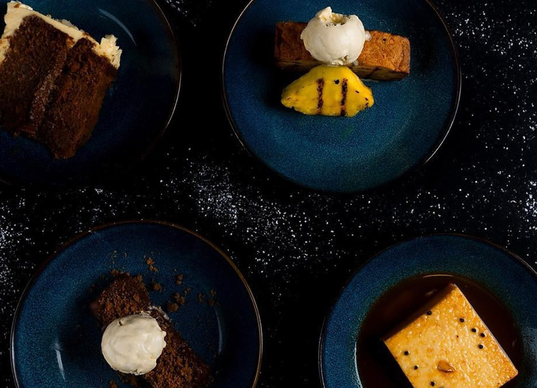 A Costa Rican coffee farmer proudly holding freshly picked coffee cherries