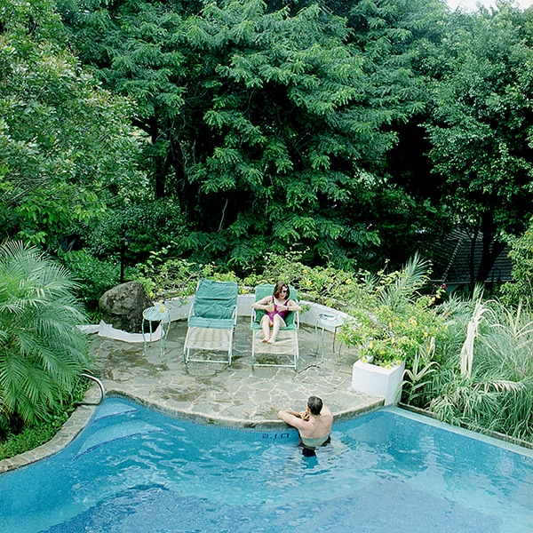 Couple at the edge of a pool